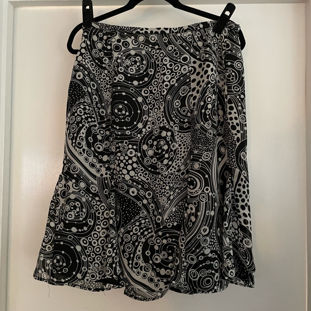 Black and white print skirt.  Above knee length, zipper in waistband.